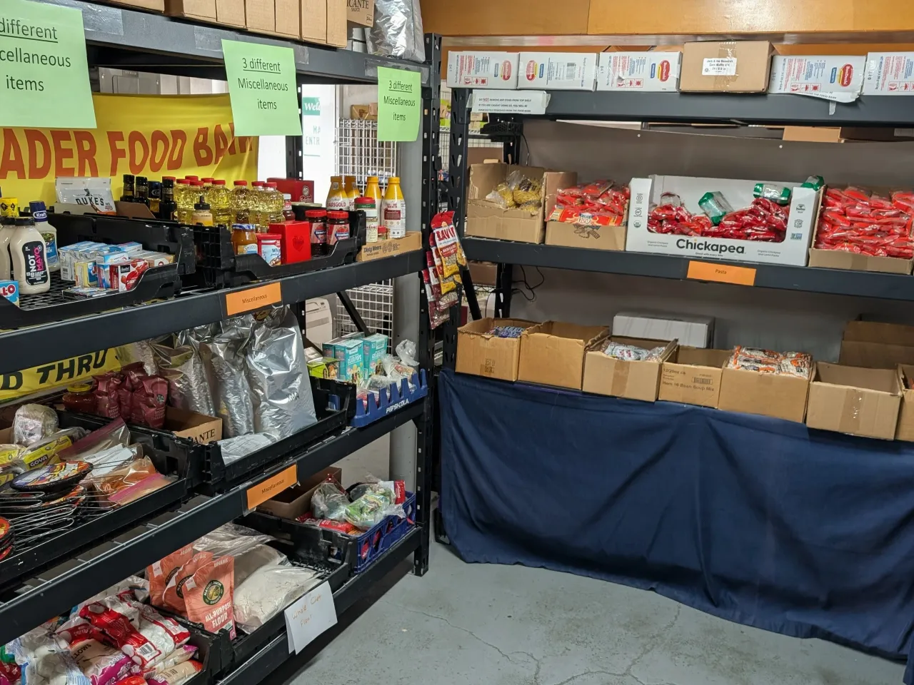 Miscellaneous food items and pantry staples stocked on the food bank shelves